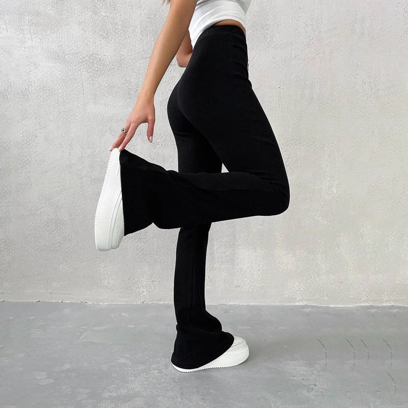 Nancie - High-Waisted Ribbed Flared Trousers Black